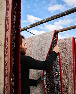 خشک کردن قالی در قالیشویی قاسم آباد مشهد 